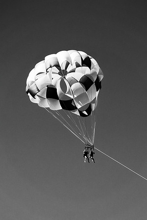 "para sailing", "black & white", air, sky, flying, boat, plane, parachute, sport, fun, vacation