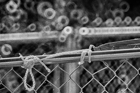 circles, net, fence, "black & white", bertazzoni, abstract, "mirror lens", knot, yard, artistic